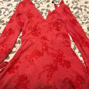 Hot pink ruffled romper